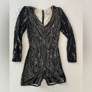 Black sequin romper by Ieena for MacDuggal